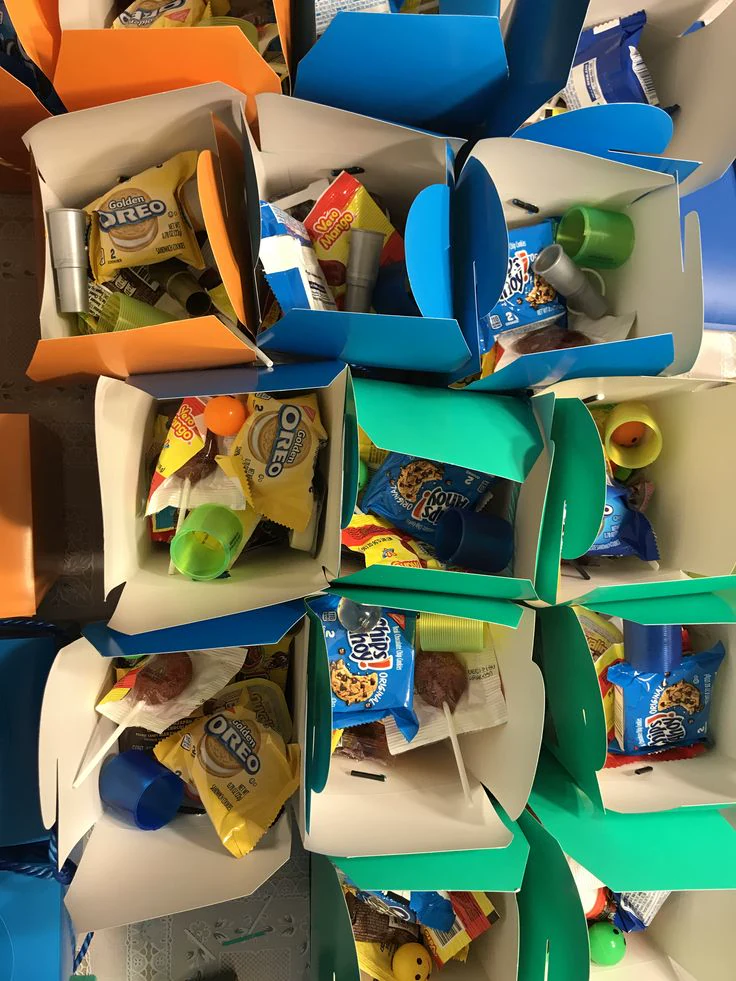 Colourful activity boxes packed with toys and snacks