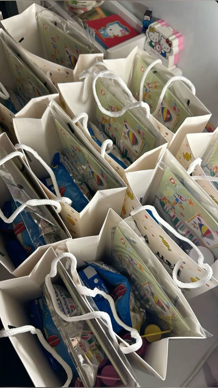 Creative activity sets arranged in individual party bags