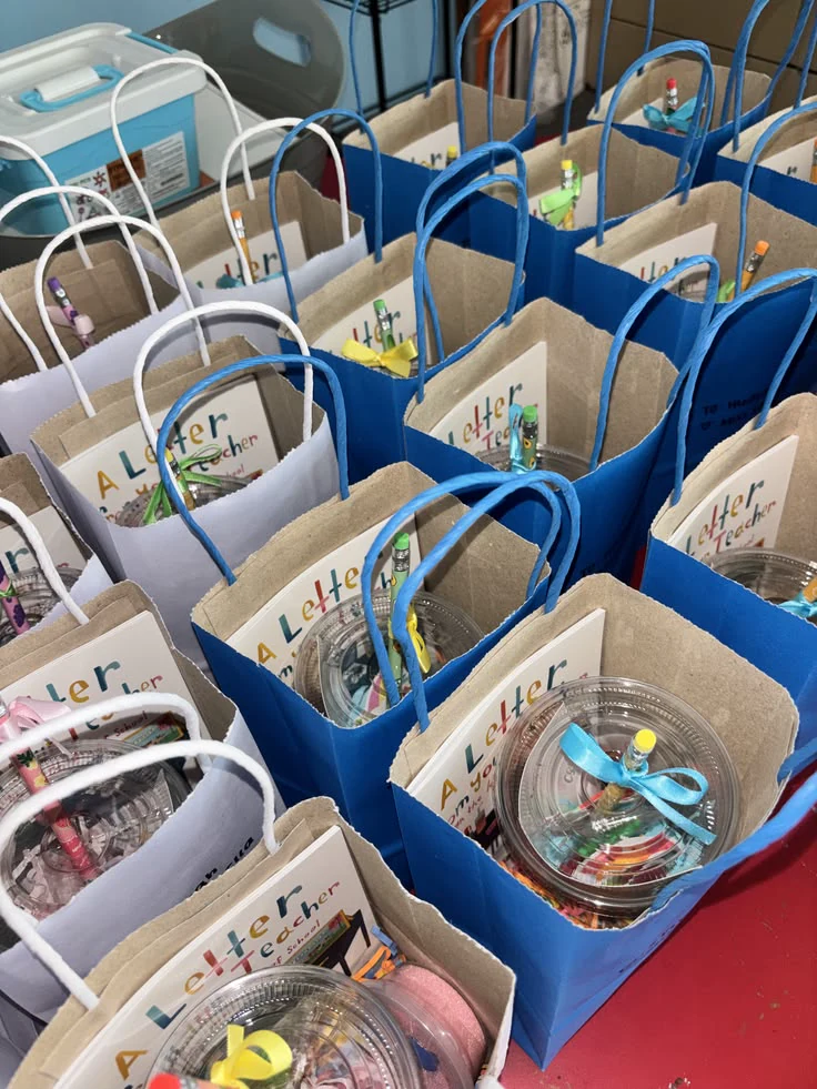Blue and natural gift bags with creative learning activities