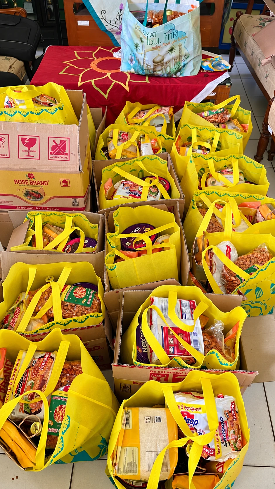 Yellow celebration bags filled with family treats