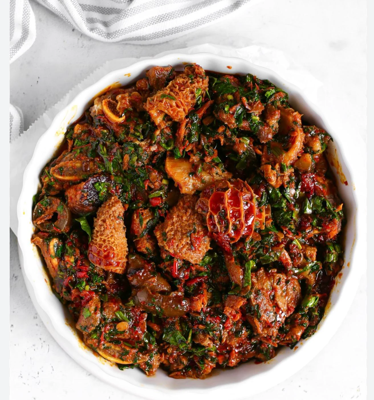 A vibrant platter of assorted meats and greens
